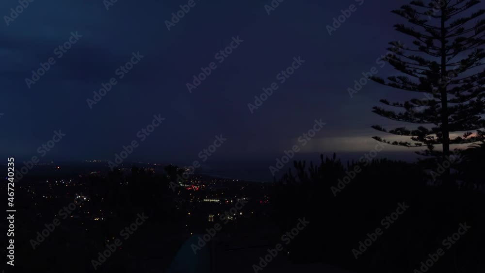 Lightning strikes at night over the city of Ventura, California during a large electrical storm. Lightning strikes at night over the city of Ventura, California during a large electrical storm.
