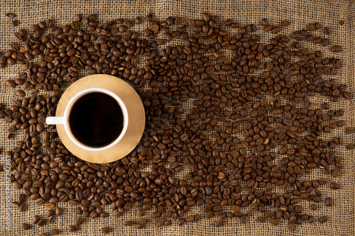 Cup of Coffee and Coffee Beans, top view