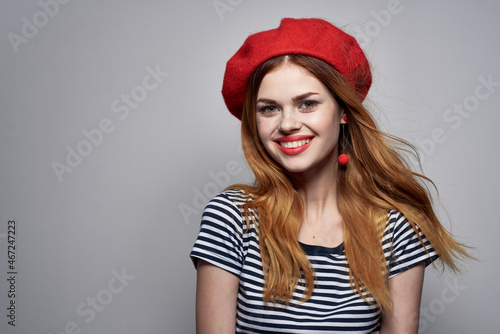 beautiful woman wearing a red hat makeup France Europe fashion posing model studio