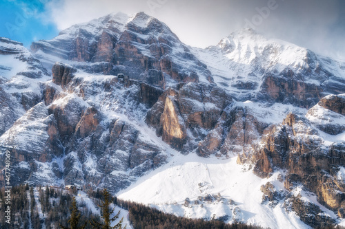 Obraz na płótnie The slopes of the Tofana Massif, Dolomites, Cortina d'Ampezzo region. One of the ski areas of the world's largest ski resort Dolomiti Superski. Winter in the mountains. w salonie
