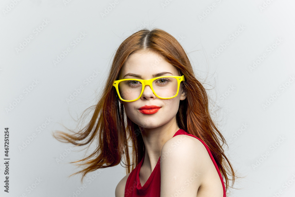 pretty woman yellow glasses hairstyle fashion close-up pretty woman yellow glasses hairstyle fashion close-up