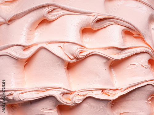 Frozen Peach flavour gelato - full frame detail. Close up of an orange- beige surface texture of Ice cream .