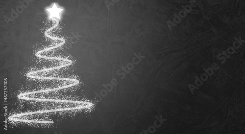 Fondo gris navideño con árbol de navidad en luces.