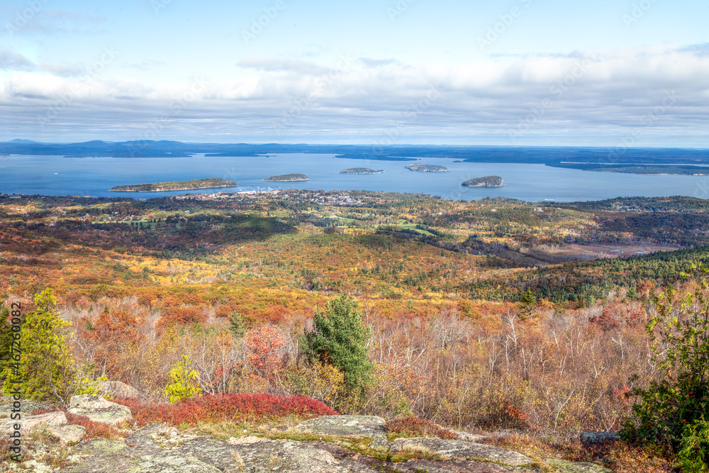 Bar Harbor and the Islands of Frenchman Bay are seen in autumn from atop Cadillac Mountain in Acadia Nation Park on Mt. Desert Island, Down East Maine.