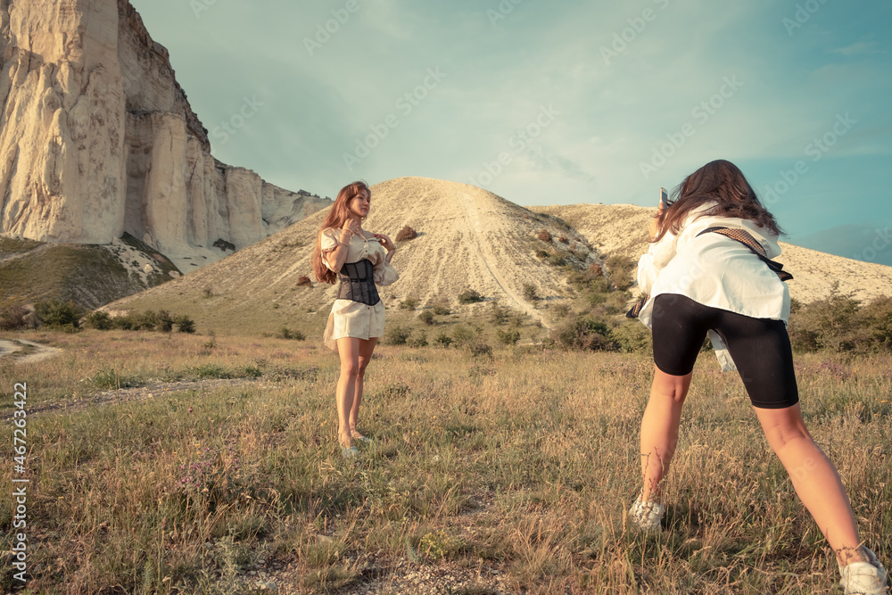Naklejka premium Young girl posing in the open air. Day. Summer.