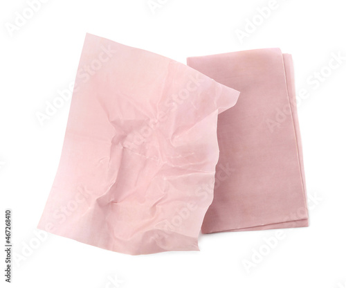 Pink reusable beeswax food wraps on white background, top view