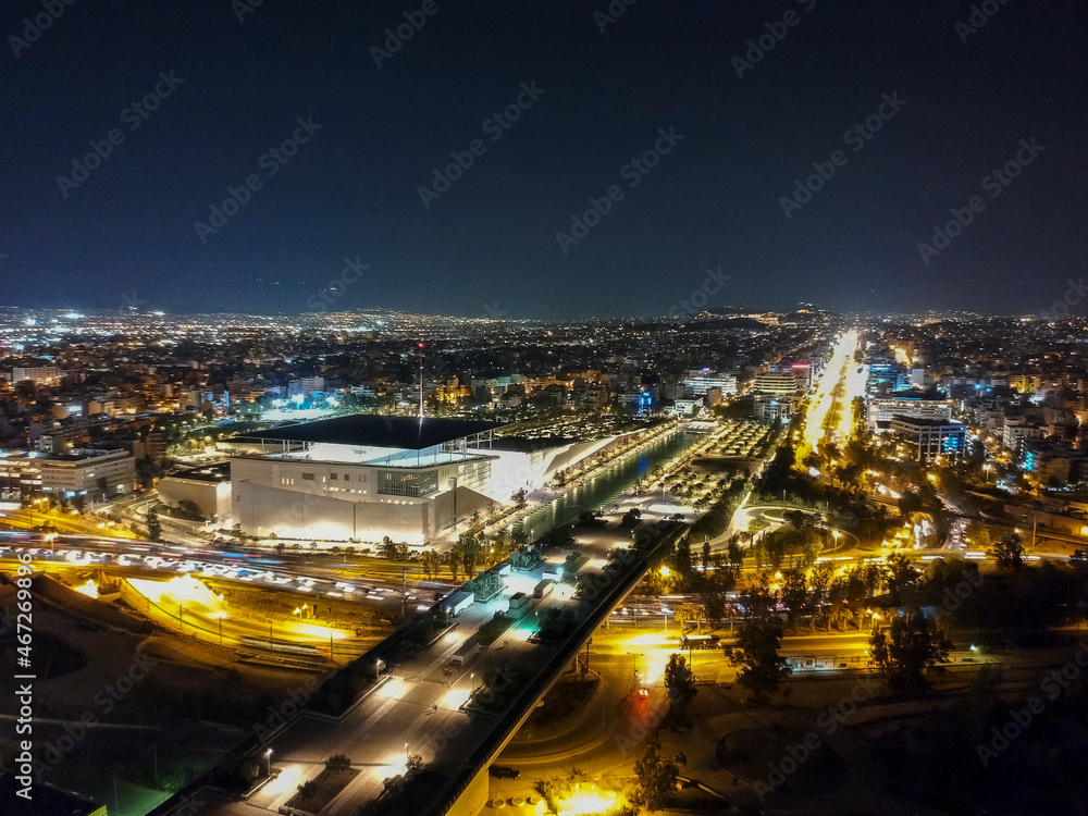 Aerial cityscape view of southern Athens at night.