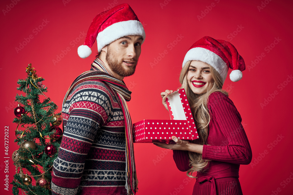 emotional man and woman gifts christmas new year red background emotional man and woman gifts christmas new year red background