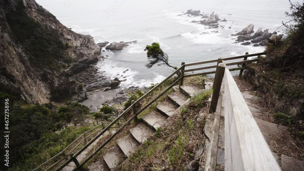Tramp endeavoring to Torimbia Asturias Spain beach Tramp endeavoring to Torimbia Asturias Spain beach