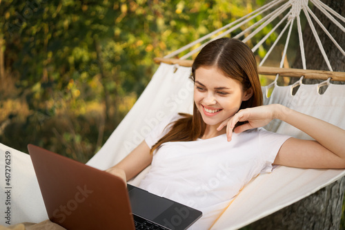 woman love with laptop on nature vacation work travel © VICHIZH