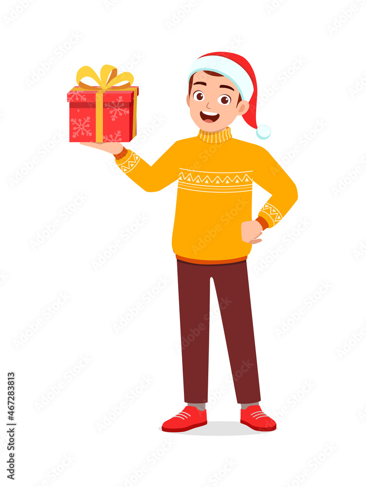 young man holding box present in christmas young man holding box present in christmas