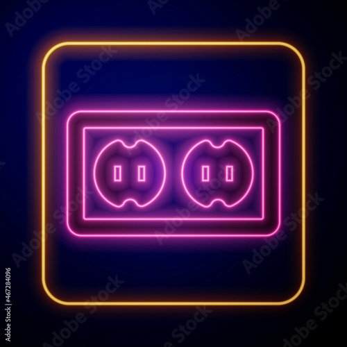 Glowing neon Electrical outlet icon isolated on black background. Power socket. Rosette symbol. Vector