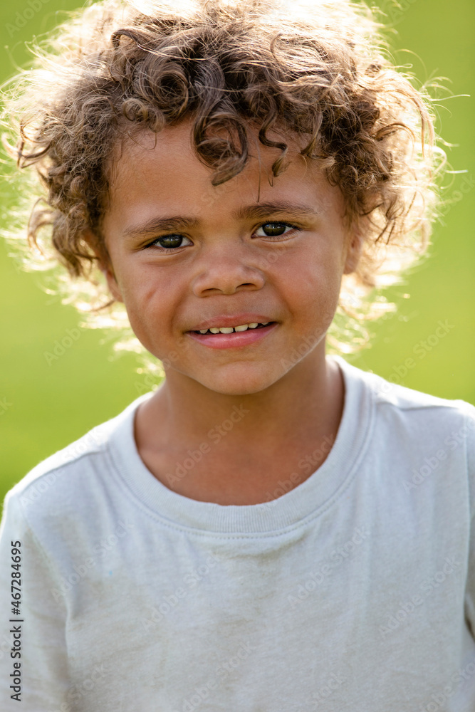 Portrait of a handsome young diverse black boy with curly hair Portrait of a handsome young diverse black boy with curly hair