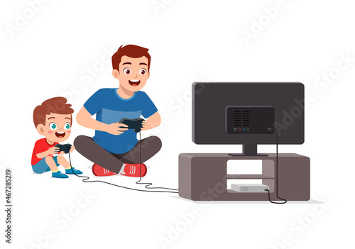 cute little boy play video game on big screen