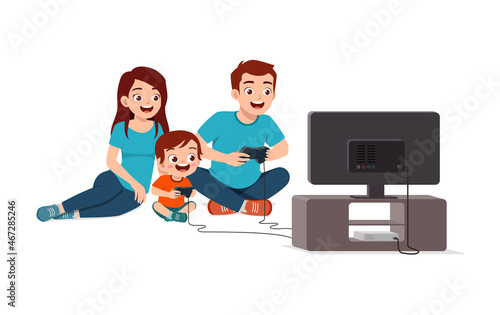 cute little boy play video game on big screen