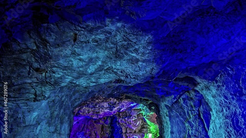 Timelase video of amazing view of Blue-lit cave with reflections, in viking valley, Norway. Shot in 5k. photo