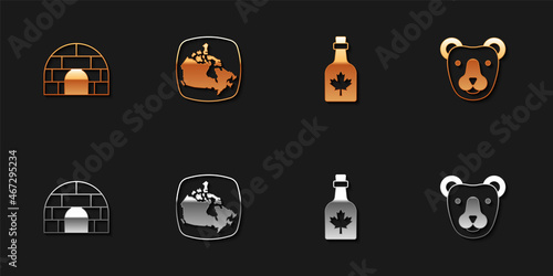 Set Igloo ice house, Canada map, Bottle of maple syrup and Bear head icon. Vector