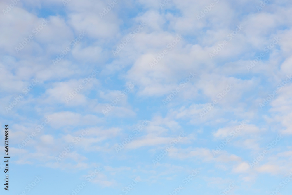 Wispy tiny clouds in sunshine early in the morning Wispy tiny clouds in sunshine early in the morning