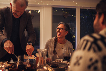 Family having traditional Christmas dinner