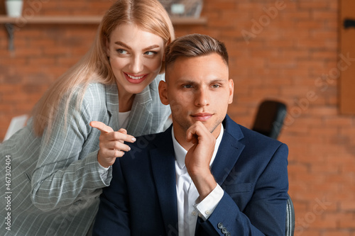 Male and female colleagues ...