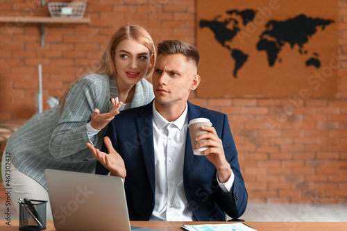 Male and female colleagues ...