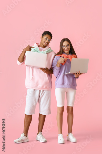 Stylish young couple in hoo...