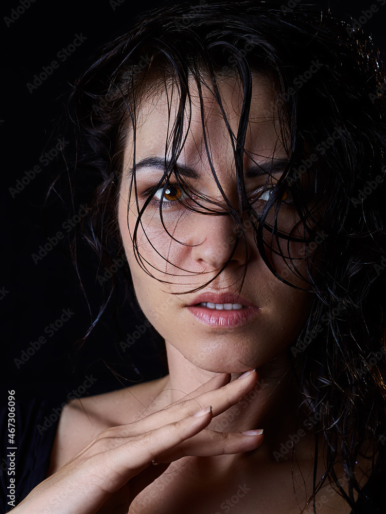 sensual girl, model on a black background photo shoot in the studio sensual girl, model on a black background photo shoot in the studio