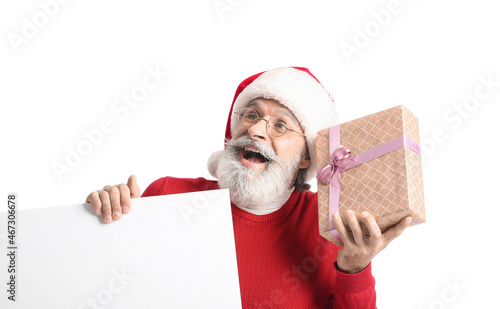 Stylish mature man in Santa...