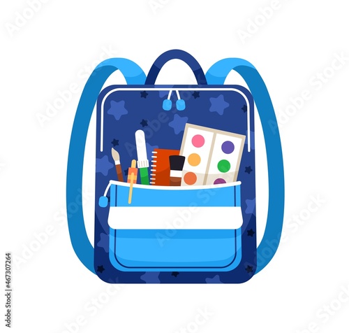 Schoolbag with school supplies in front pocket of bag. Kids backpack with sta...