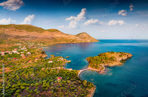 Wonderful summer view from flying drone of Purpose or Double beach, Kotronas town location. Amazing evening seascape of Mediterranean sea, Peloponnese peninsula, Greece, Europe.