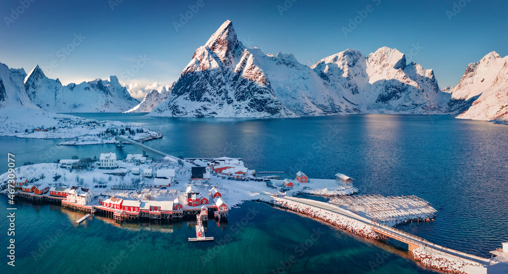 Photography ofHamnoy villege. Bright winter view from flying drone of Lofoten Island, Norway, Europe. Splendid sescape of Norwegian sea. Vacation concept background..