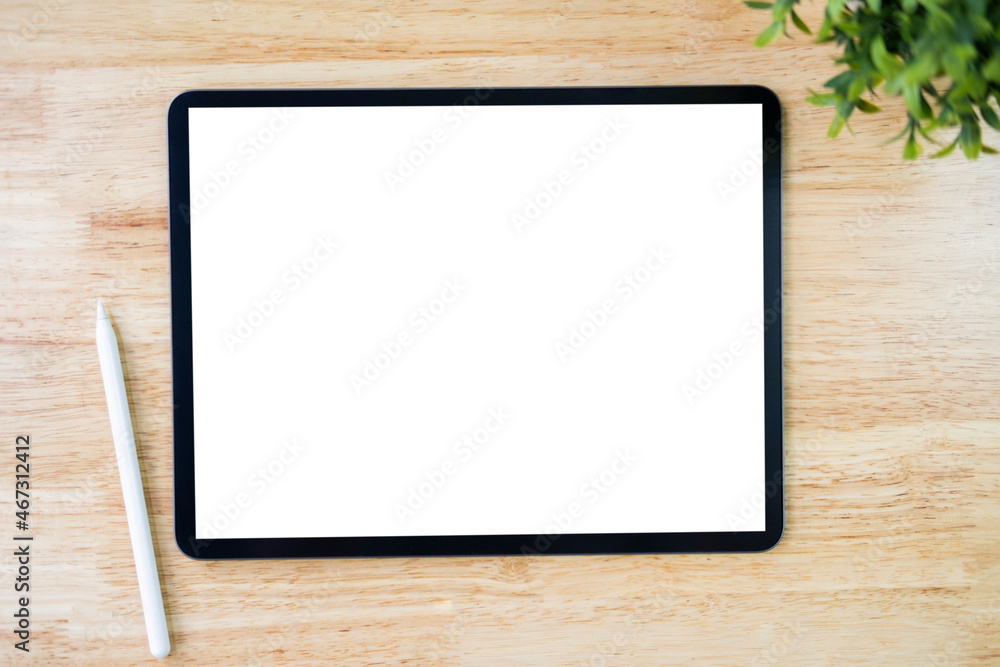 Digital tablet mockup on office working table Digital tablet mockup on office working table