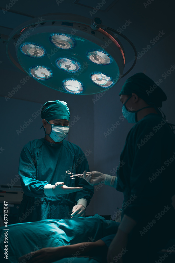 Team of doctors wearing protective clothing works together to monitor patients in Bright Modern