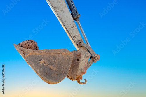  bucket filled with soil under blue sky