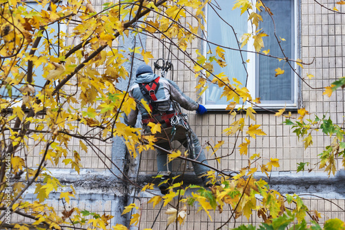 Industrial climber at work. Candid.