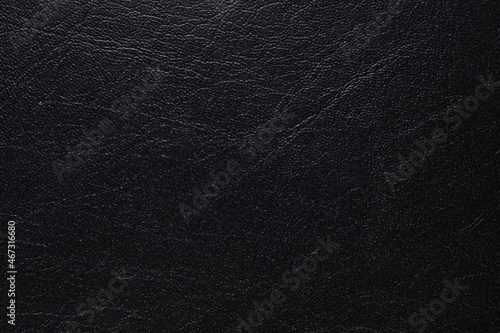The texture of the dark artificial leather dermantin.