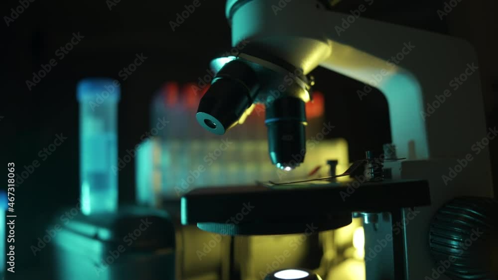 Close up of a optical scientific microscope in laboratory. Science research technology and experiments. Concept of clinical lab and medical equipment. Close up of a optical scientific microscope in laboratory. Science research technology and experiments. Concept of clinical lab and medical equipment.