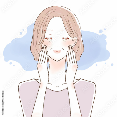 肌を保湿する中年女性