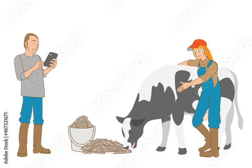 タブレットPCで牛の品質を管理する白人酪農家