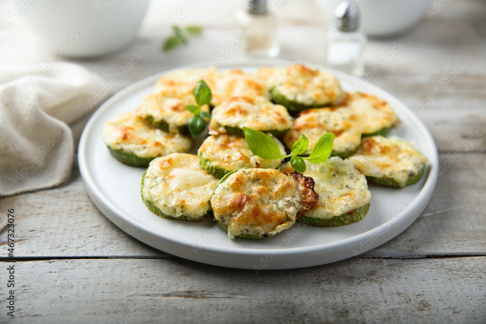 Roasted courgette with cheese and herbs