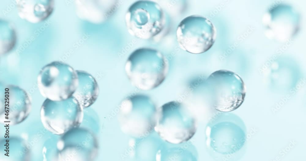 Super slow motion of falling blue hydrogel balls. Cosmetic, youth and beauty concept. Filmed on high speed cinema camera, 1000fps Super slow motion of falling blue hydrogel balls. Cosmetic, youth and beauty concept. Filmed on high speed cinema camera, 1000fps