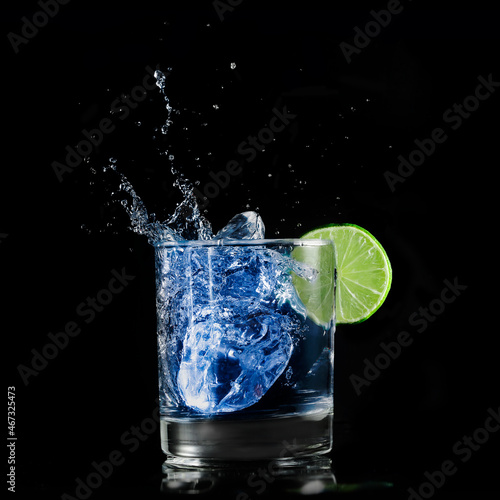 blue drink with lime slice
