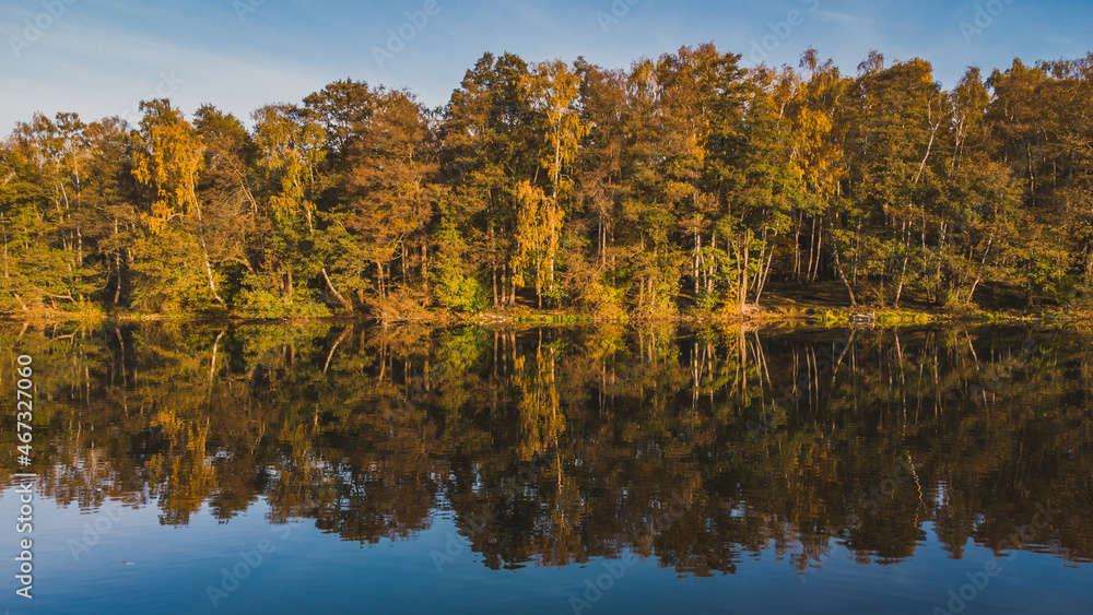 Beautiful autumn view of the forest areas and the lake. Gdańsk Stogi.