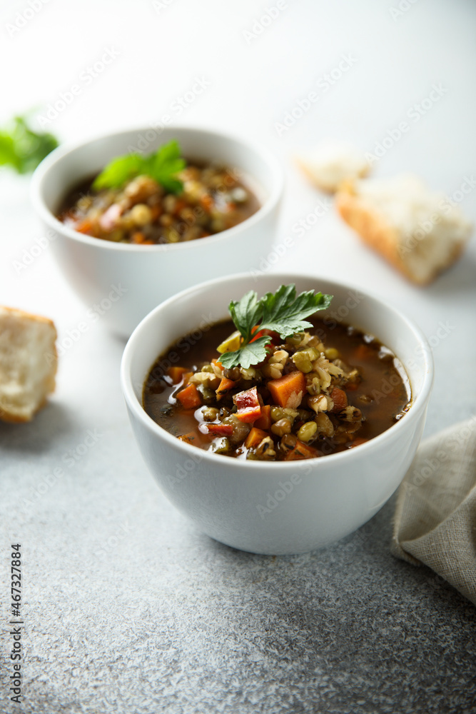 Traditional homemade lentil soup with smoked sausage Traditional homemade lentil soup with smoked sausage