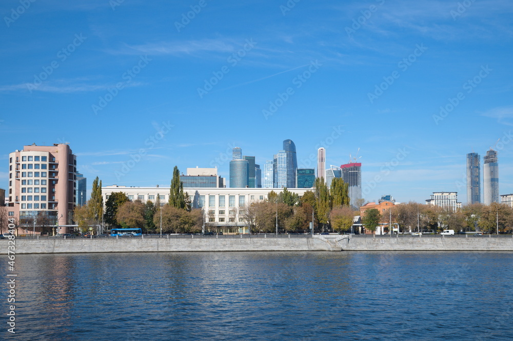 Fototapeta premium Moscow, Russia - October 9, 2021: View of the Berezhkovskaya embankment on an autumn sunny day 