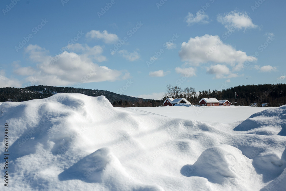 Beautiful view of traditional norwegian rorbu houses in countryside on sunny winter day Beautiful view of traditional norwegian rorbu houses in countryside on sunny winter day