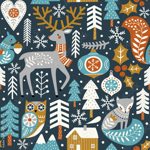 Seamless vector pattern with cute woodland animals, trees and snowflakes on dark blue background. Scandinavian Christmas illustration. Perfect for textile, wallpaper or print design. 