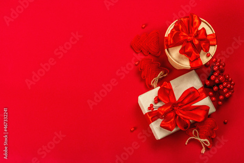 Gift concept in red colors. New Year or Christmas, festive mood