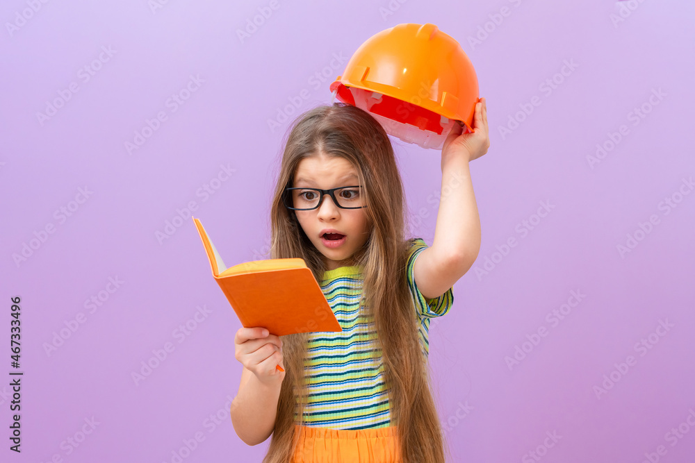 The little girl is very surprised by the upcoming repairs in her nursery. The little girl is very surprised by the upcoming repairs in her nursery.