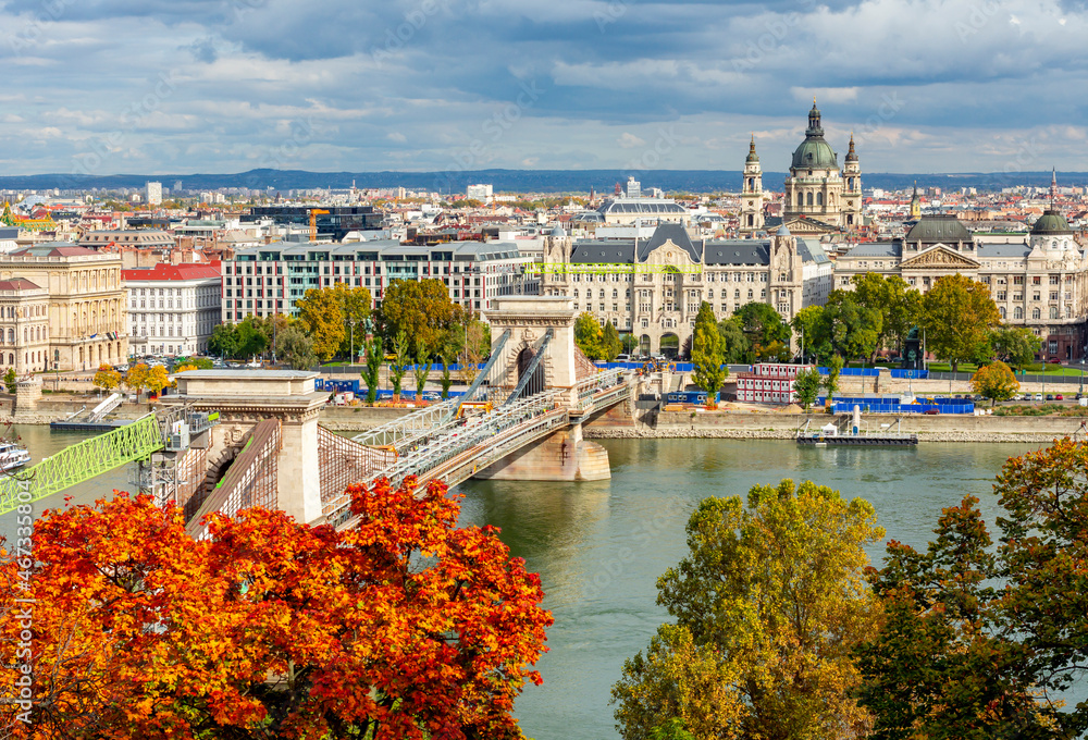 Chain Bridge over Danube river and St. Stephen's basilica dome in autumn, Budapest, Hungary